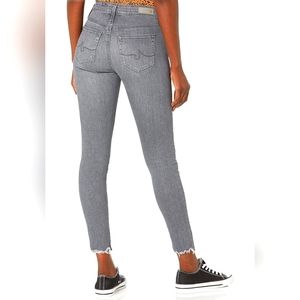 AG Legging Skinny Jean Size 27 light grey with Frayed Leg. Excellent Condition